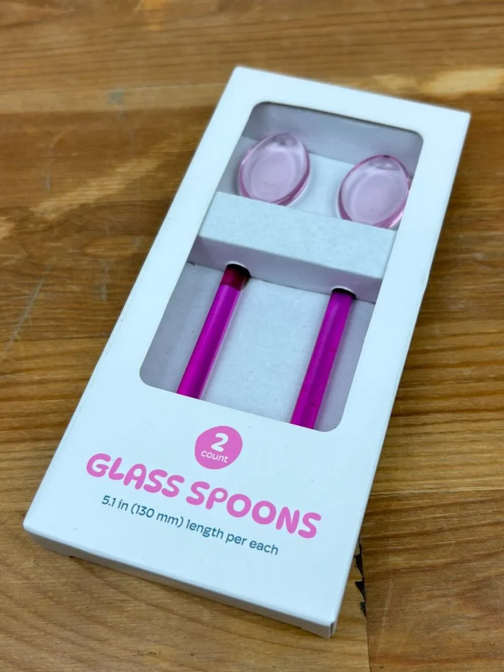Set of two stylish pink glass spoons for coffee, tea, or cocktails. New
